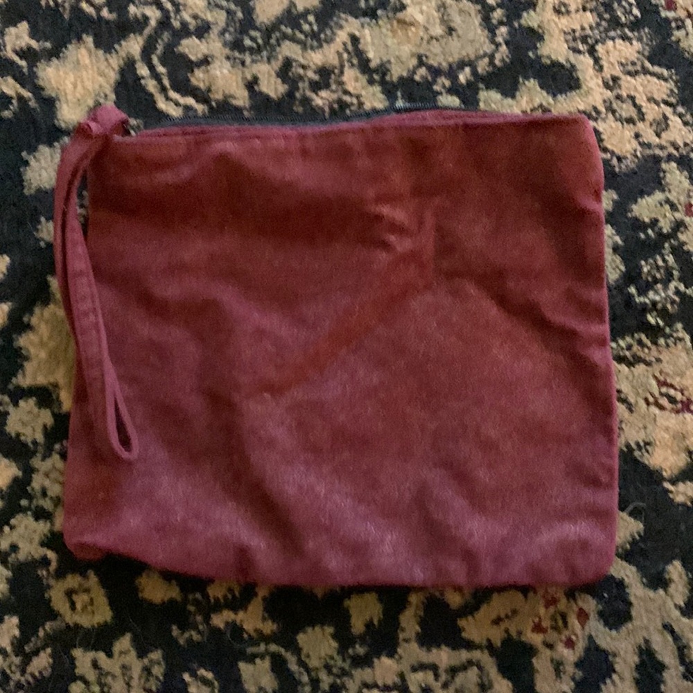 Used makeup wristlet from color proof